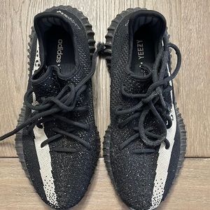 Yeezy Black and Tan adidas men’s sneakers.